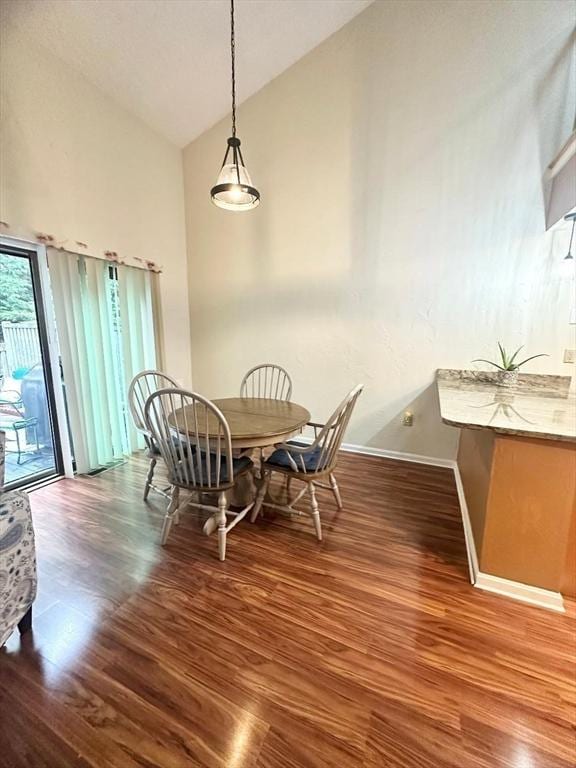 6 Tamarack Ln Unit 6, Peabody, MA 01960 - dining area featuring wood finished floors and high vaulted ceiling
