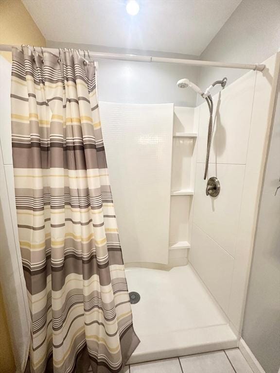 6 Tamarack Ln Unit 6, Peabody, MA 01960 - bathroom with a shower with curtain and tile patterned flooring