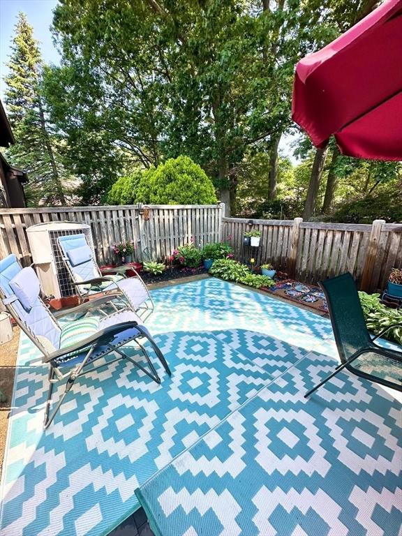 6 Tamarack Ln Unit 6, Peabody, MA 01960 - view of patio / terrace with view of wooded area
