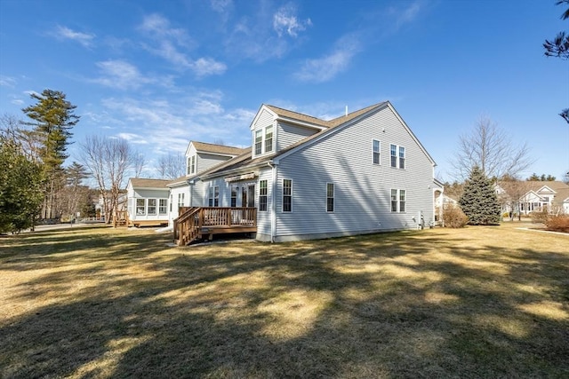 exterior space with a wooden deck and a yard