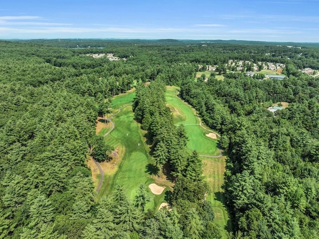 aerial view featuring a wooded view