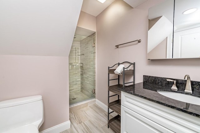 170 I St Unit 1, Boston, MA 02127 - full bath with a stall shower, baseboards, toilet, and vanity