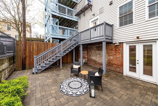 170 I St Unit 1, Boston, MA 02127 - view of patio / terrace with french doors, stairway, fence, and a wooden deck