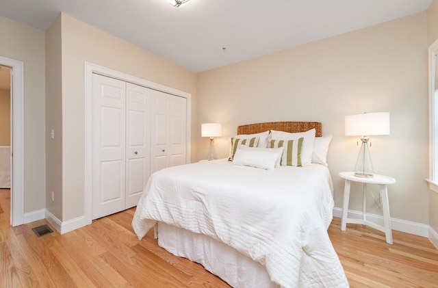 170 I St Unit 1, Boston, MA 02127 - bedroom featuring light wood-style flooring, baseboards, and a closet