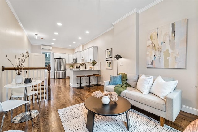 living room featuring a wall unit AC, dark wood-type flooring, and ornamental molding