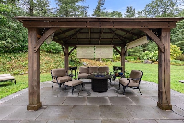 view of patio / terrace with a gazebo and an outdoor living space with a fire pit