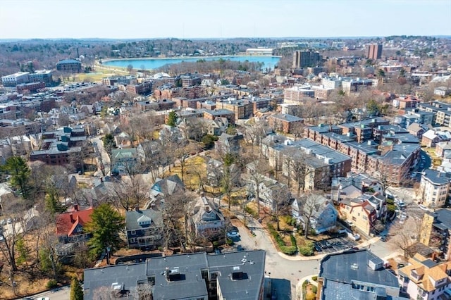 view of urban area featuring a nearby body of water