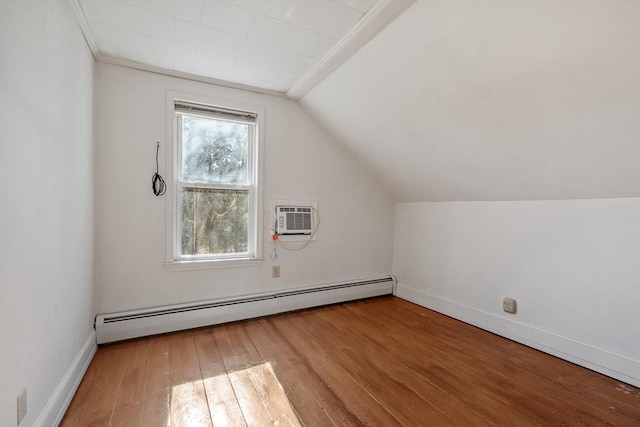 bonus room with baseboards, a wall mounted AC, lofted ceiling, wood-type flooring, and a baseboard heating unit