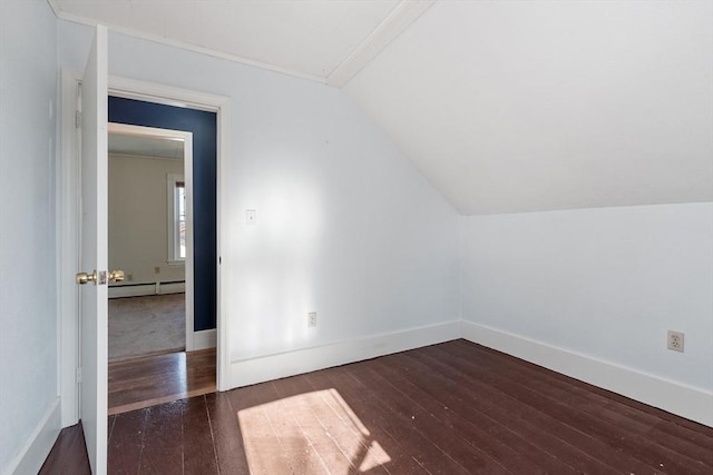 bonus room featuring vaulted ceiling, baseboard heating, baseboards, and hardwood / wood-style flooring