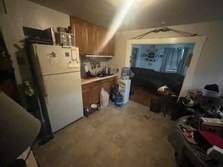 kitchen featuring white refrigerator