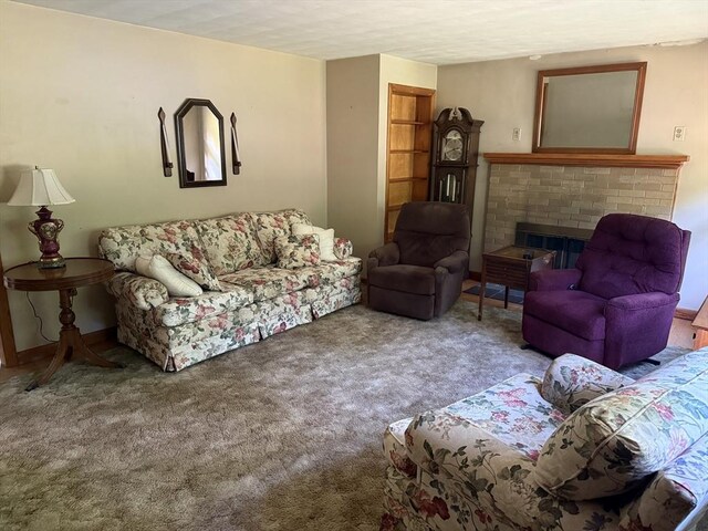 4 King Ln, Monson, MA 01057 - carpeted living area with a fireplace