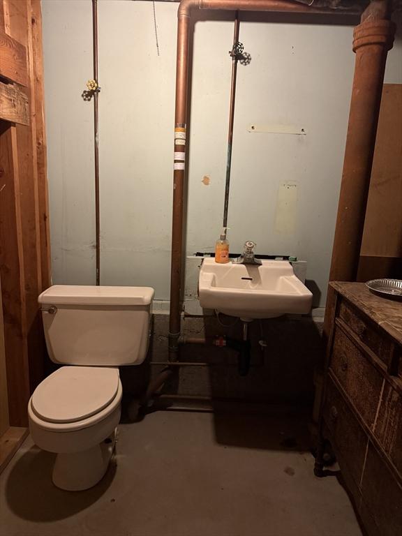 4 King Ln, Monson, MA 01057 - bathroom with toilet, concrete floors, and a sink