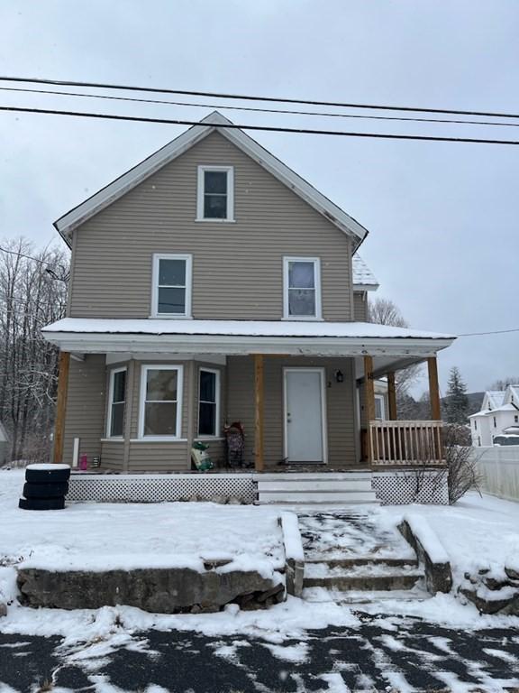 view of front of property featuring covered porch