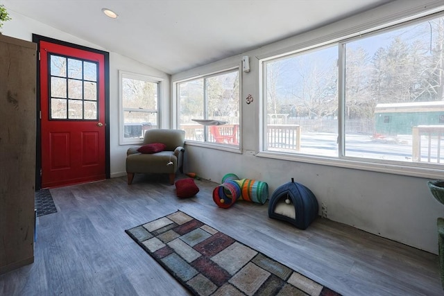 sunroom / solarium with vaulted ceiling