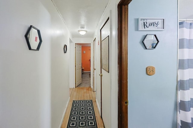 corridor featuring light wood-type flooring