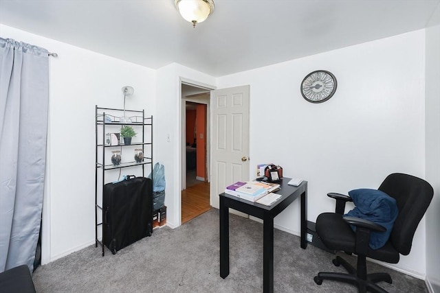 home office featuring light colored carpet