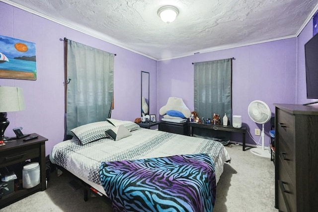 bedroom with ornamental molding, light carpet, and a textured ceiling