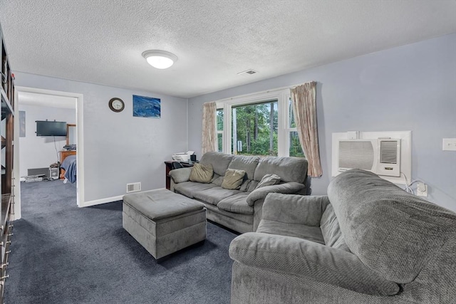 42 Charlotte Furnace Rd, Wareham, MA 02576 - living room featuring an AC wall unit, carpet flooring, and a textured ceiling