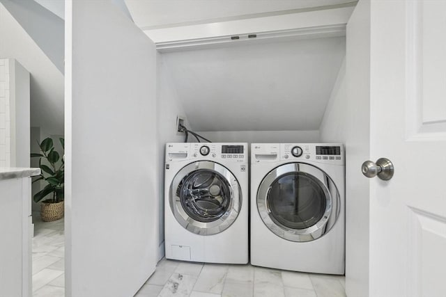 laundry area with separate washer and dryer