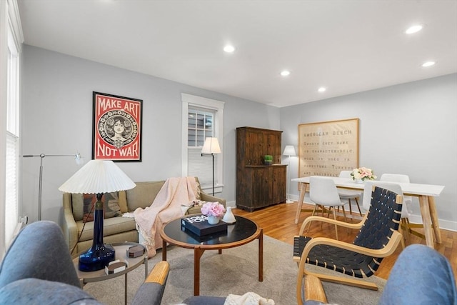 living room with light hardwood / wood-style flooring