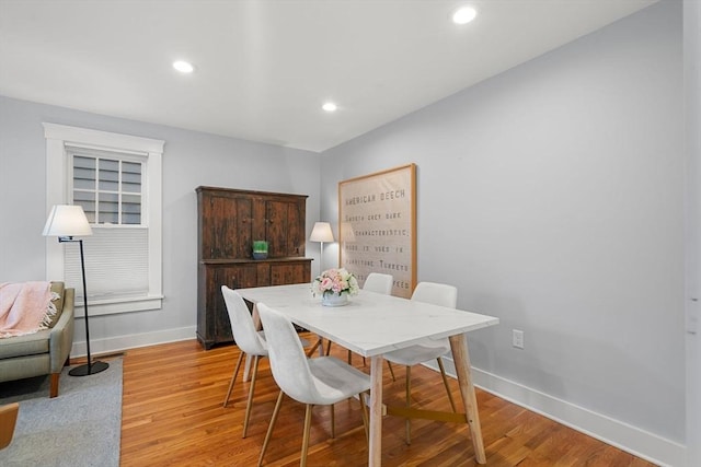 dining room featuring light hardwood / wood-style floors