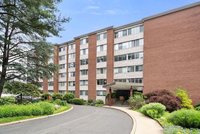 22 Chestnut Pl Unit 111, Brookline, MA 02445 - view of apartment building / complex