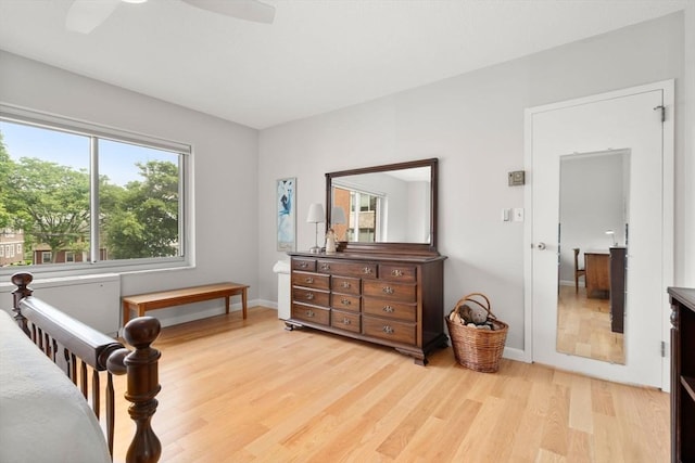 22 Chestnut Pl Unit 111, Brookline, MA 02445 - bedroom featuring light wood-style floors and a ceiling fan