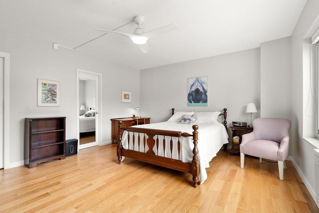 22 Chestnut Pl Unit 111, Brookline, MA 02445 - bedroom featuring light wood-style floors and a ceiling fan