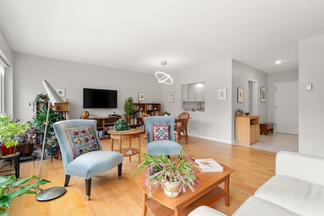 22 Chestnut Pl Unit 111, Brookline, MA 02445 - living area with light wood-type flooring