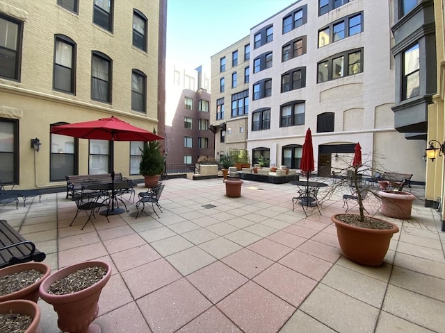 view of home's community featuring a patio