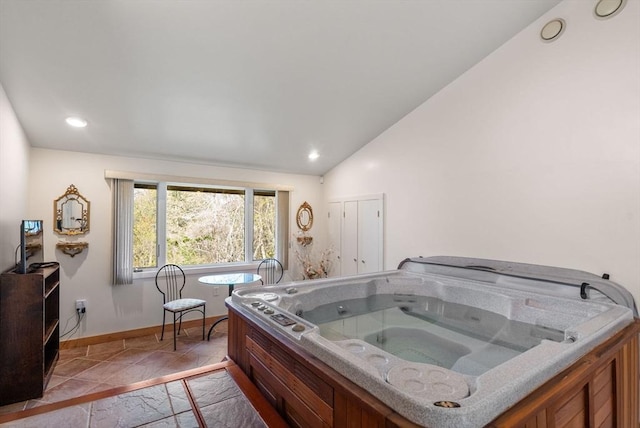 16 Wadsworth Ln, Dartmouth, MA 02748 - bathroom with lofted ceiling, baseboards, and recessed lighting