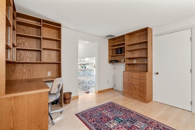 16 Wadsworth Ln, Dartmouth, MA 02748 - home office with built in study area and light wood-type flooring