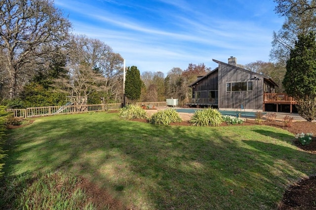 16 Wadsworth Ln, Dartmouth, MA 02748 - view of yard featuring a deck and a sunroom