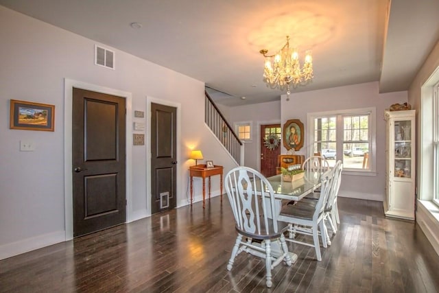 56 Otis-Tolland Rd, Blandford, MA 01008 - dining space with a chandelier, stairway, and dark wood finished floors