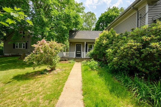661 Main St, Hanson, MA 02341 - view of green lawn featuring covered porch