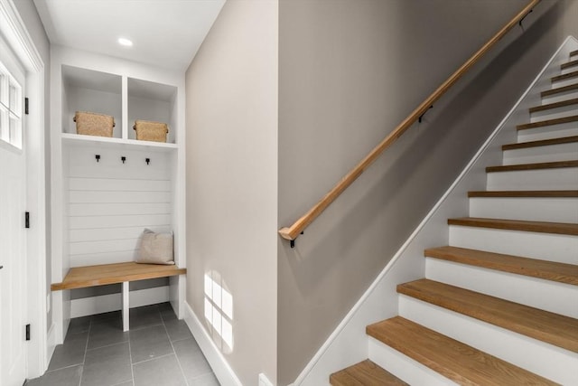 110 Fayette Unit 110, Watertown, MA 02472 - mudroom with a healthy amount of sunlight, baseboards, tile patterned flooring, and recessed lighting