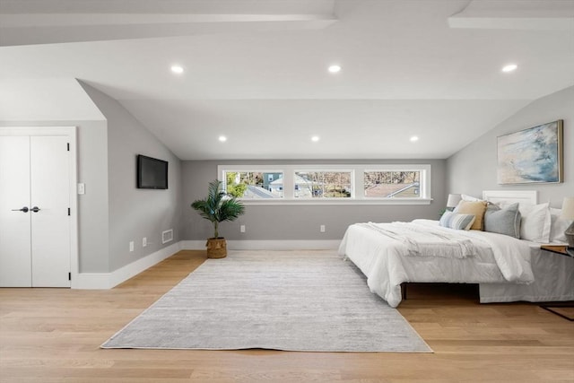 110 Fayette Unit 110, Watertown, MA 02472 - bedroom with recessed lighting, light wood-style flooring, visible vents, and vaulted ceiling