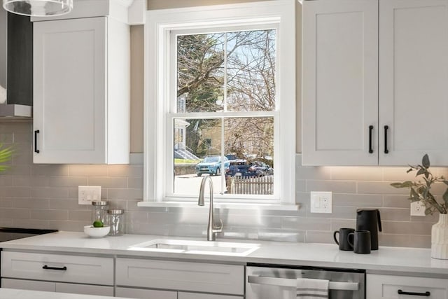 110 Fayette Unit 110, Watertown, MA 02472 - bar featuring stainless steel dishwasher, a sink, and backsplash