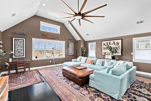 living area featuring visible vents, baseboards, a ceiling fan, and wood finished floors