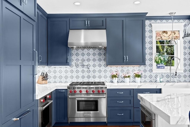 kitchen featuring a sink, light stone counters, backsplash, range hood, and appliances with stainless steel finishes