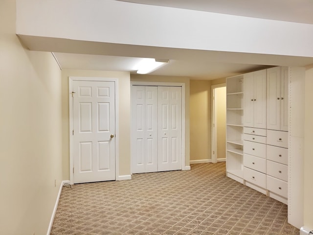 unfurnished bedroom featuring carpet