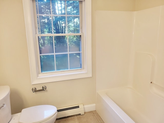 bathroom with tile patterned flooring, plenty of natural light, baseboard heating, and toilet