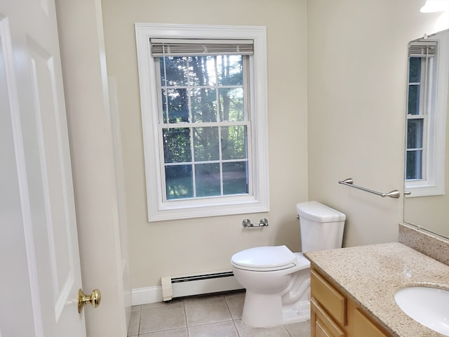 bathroom featuring vanity, toilet, a baseboard radiator, and tile patterned flooring