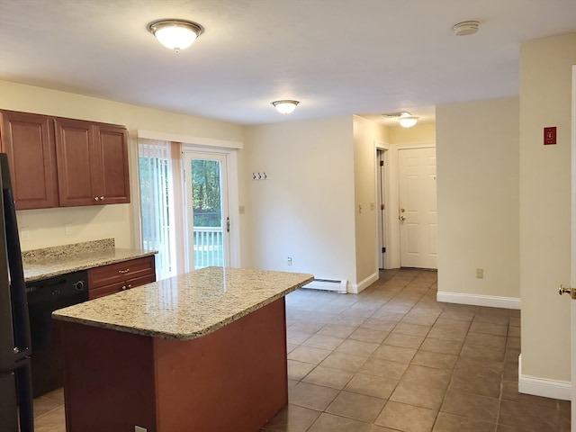 kitchen with light tile patterned floors, a baseboard heating unit, light stone countertops, black appliances, and a kitchen island