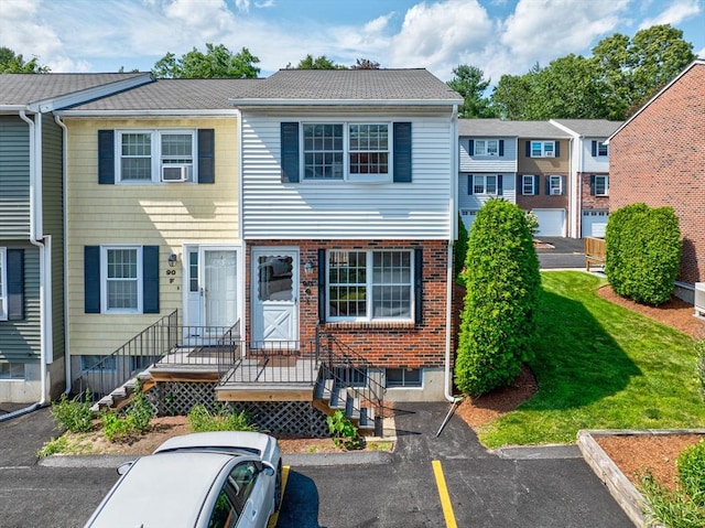 90 Roper St Unit G, Lowell, MA 01852 - view of property featuring uncovered parking