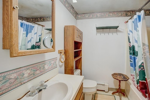 90 Roper St Unit G, Lowell, MA 01852 - full bathroom with vanity, baseboard heating, and shower / tub combo with curtain