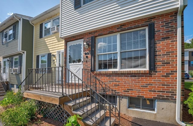 90 Roper St Unit G, Lowell, MA 01852 - entrance to property featuring brick siding and cooling unit