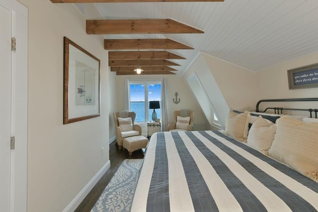 bedroom with a water view, dark hardwood / wood-style floors, and vaulted ceiling with beams