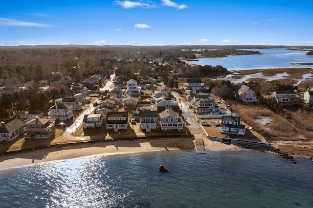 aerial view with a beach view and a water view