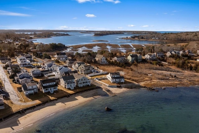 aerial view with a water view and a view of the beach